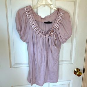 Womens pink top with lace-up neck line